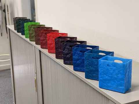 Visitors to K2022 will be able to create a custom krinkle bag from a selection of resins with highly variable viscosities including <percent>100%</percent> PCR, and various colorant options. (Photo: Business Wire)